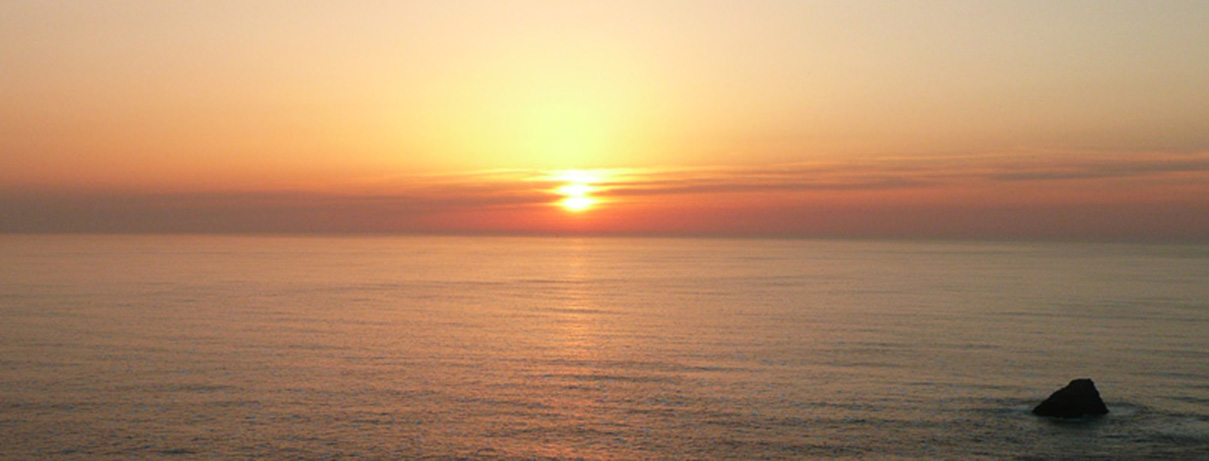 Sunset over the Atlantic at the end of the Camino